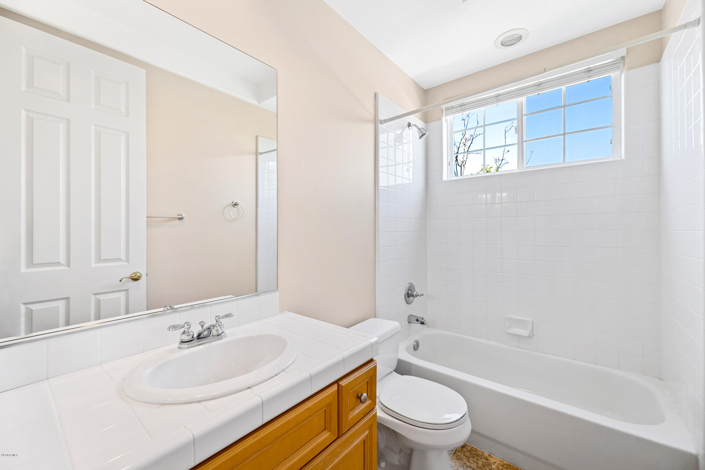 4591 Bluewood Court Moorpark, CA 93021 - Photo 13 of 43 a bathroom with a sink a toilet and shower