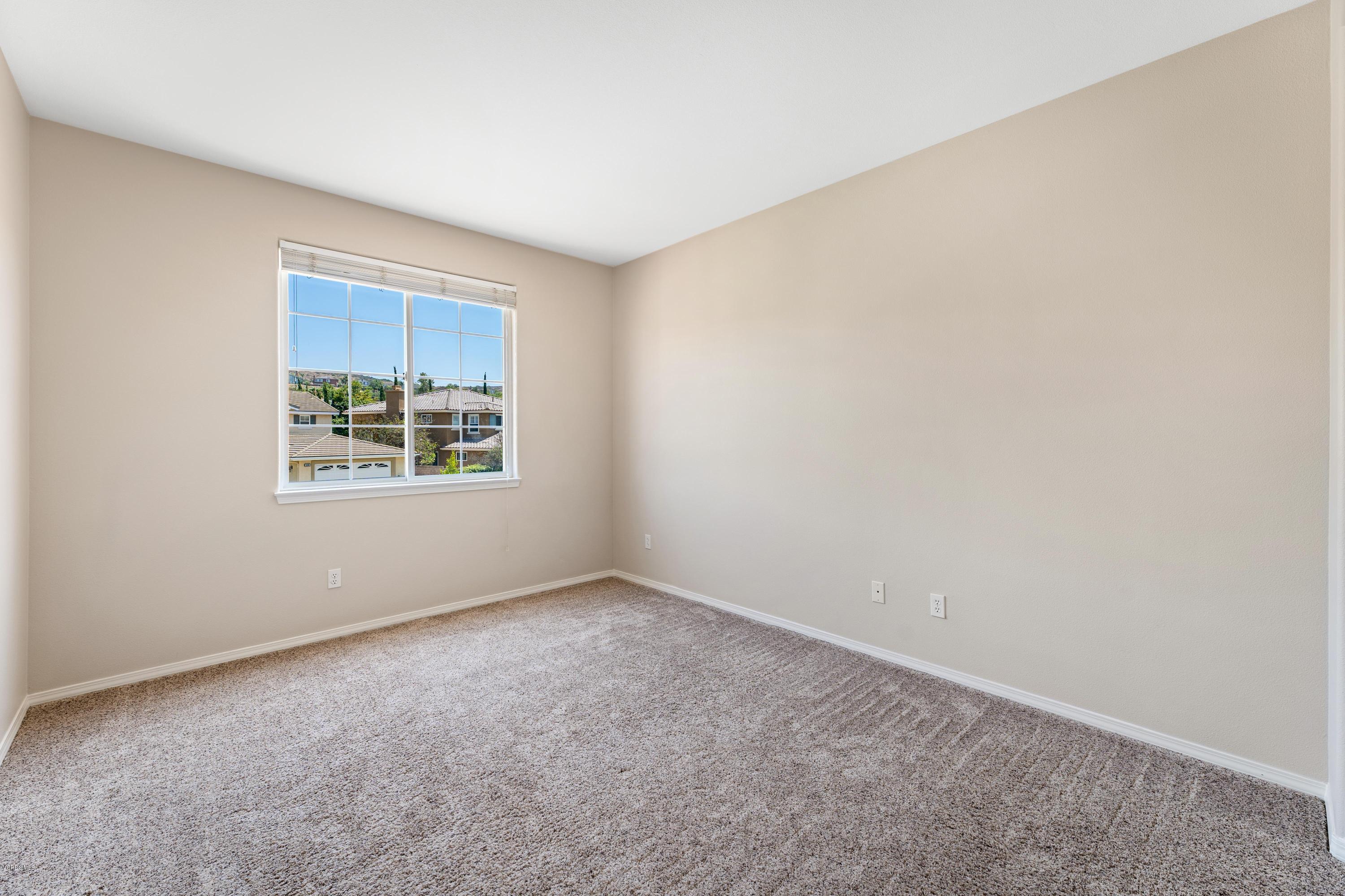 4591 Bluewood Court Moorpark, CA 93021 - Photo 20 of 43 an empty room with windows