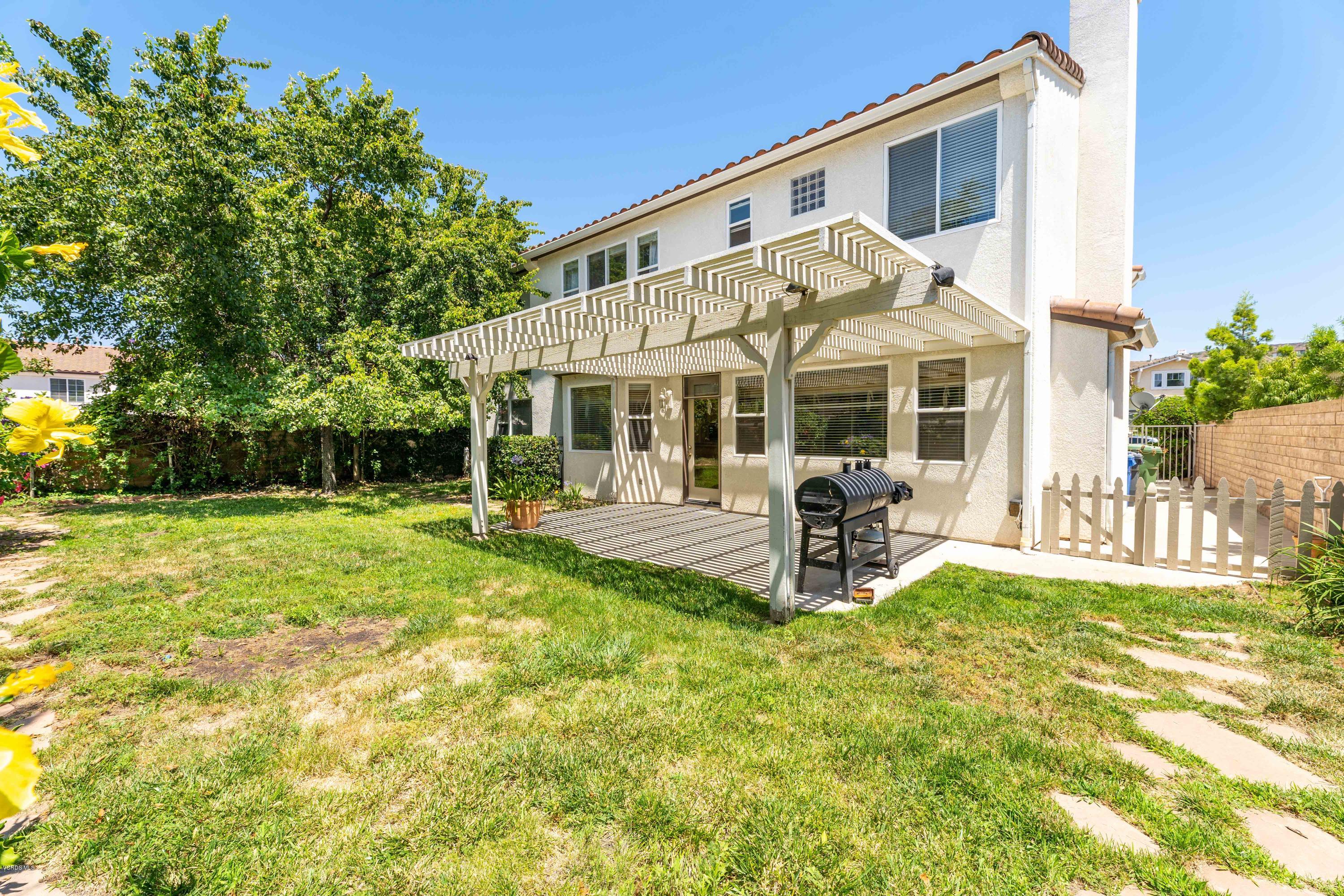 4591 Bluewood Court Moorpark, CA 93021 - Photo 39 of 43 a view of a house with backyard porch and sitting area