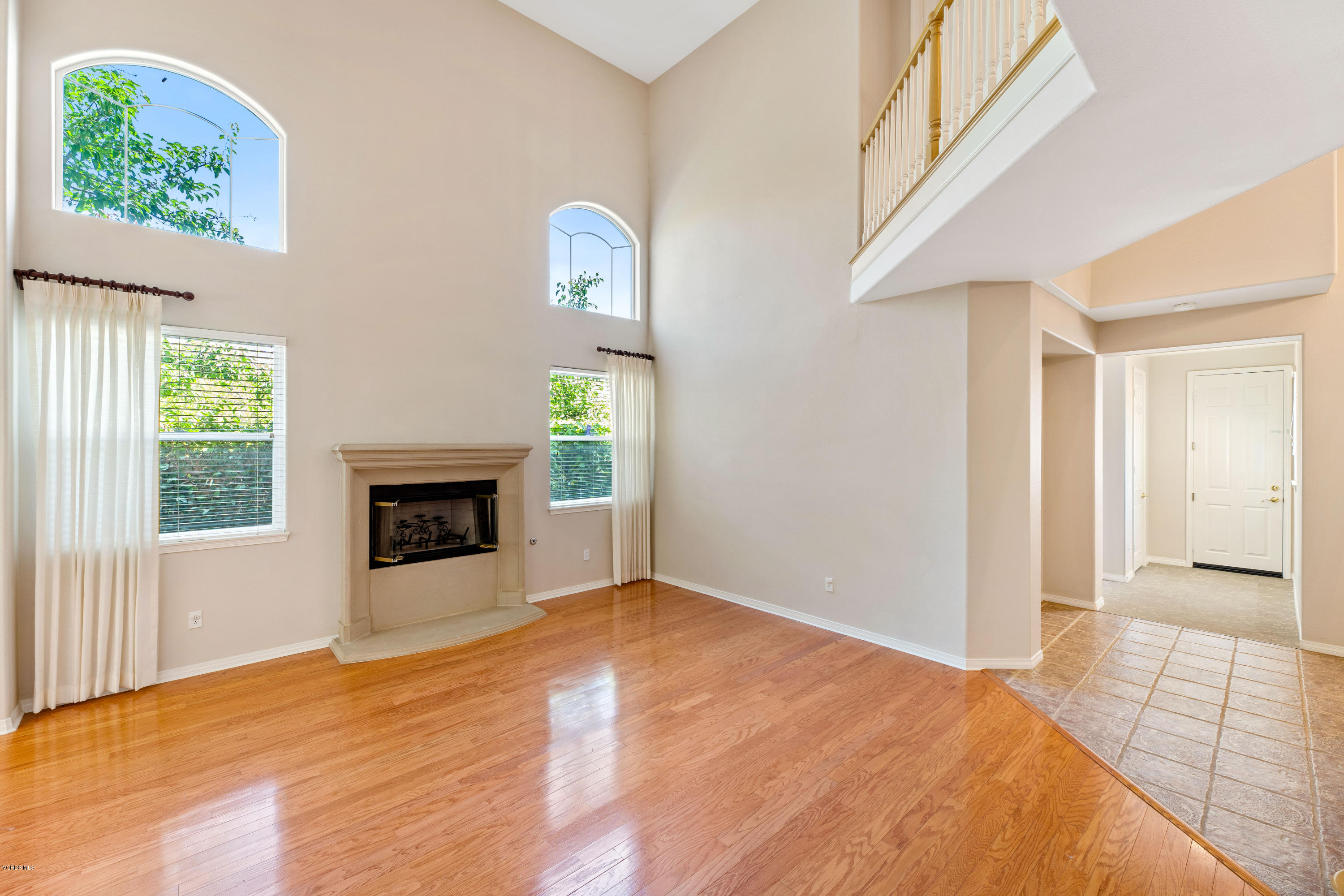 4591 Bluewood Court Moorpark, CA 93021 - Photo 9 of 43 a view of empty room with wooden floor and fan