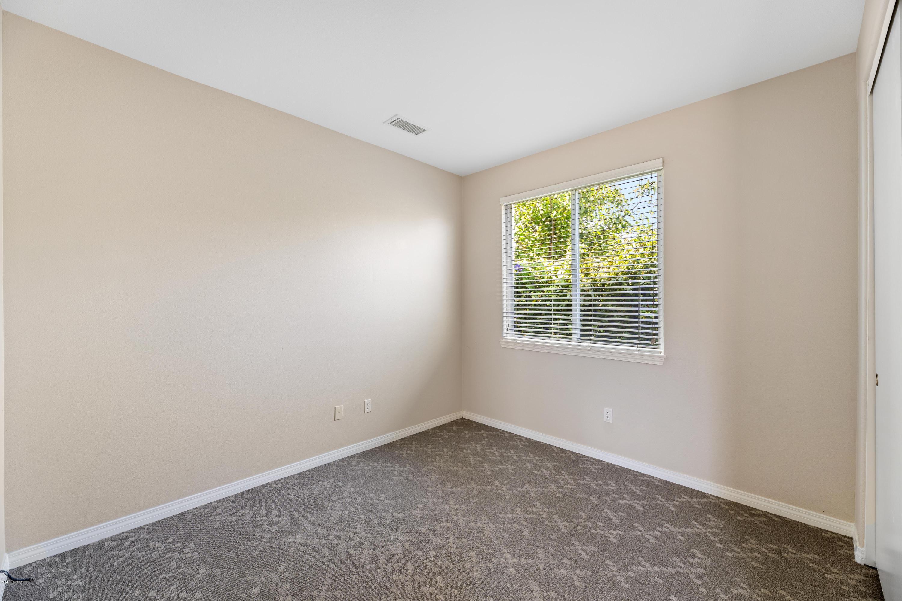 4591 Bluewood Court Moorpark, CA 93021 - Photo 10 of 43 an empty room with a window