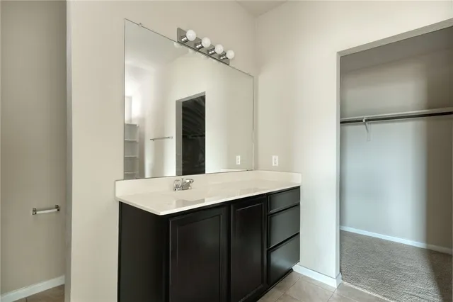 a view of a kitchen counter space with sink