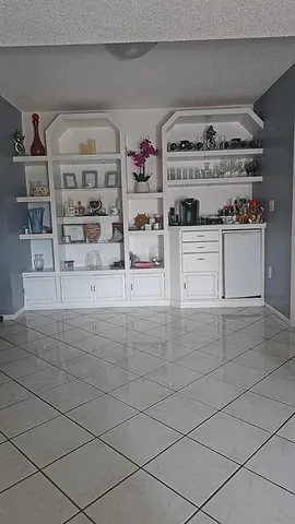 a view of cabinets and window