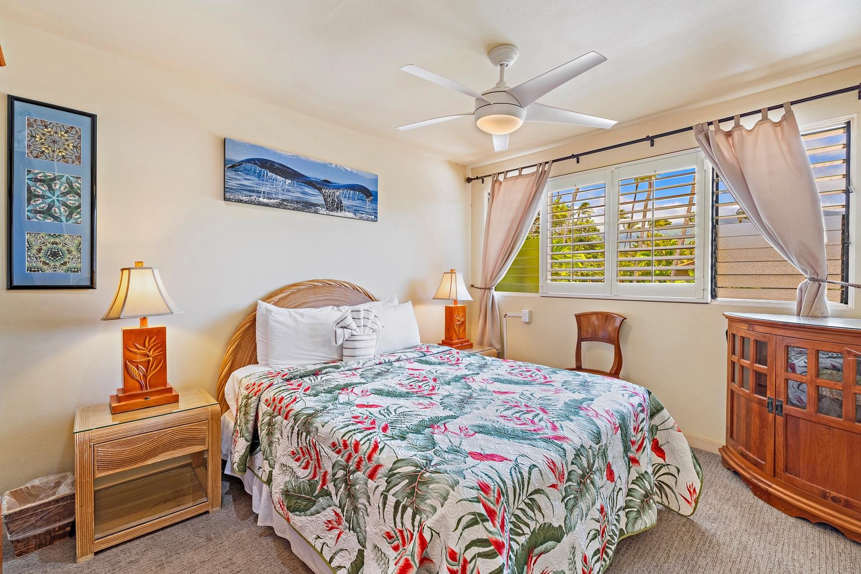 3559 Lower Honoapiilani Road, Unit 5G Lahaina, HI 96761 - Photo 23 of 42 a bedroom with a bed and a window