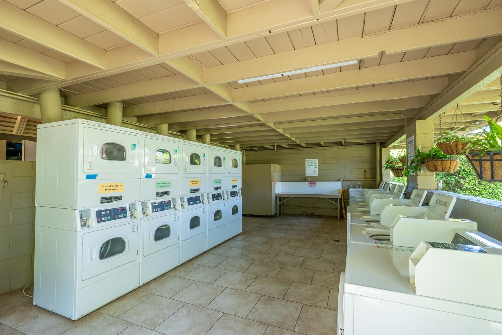 3559 Lower Honoapiilani Road, Unit 5G Lahaina, HI 96761 - Photo 38 of 42 a utility room with dryer and washer