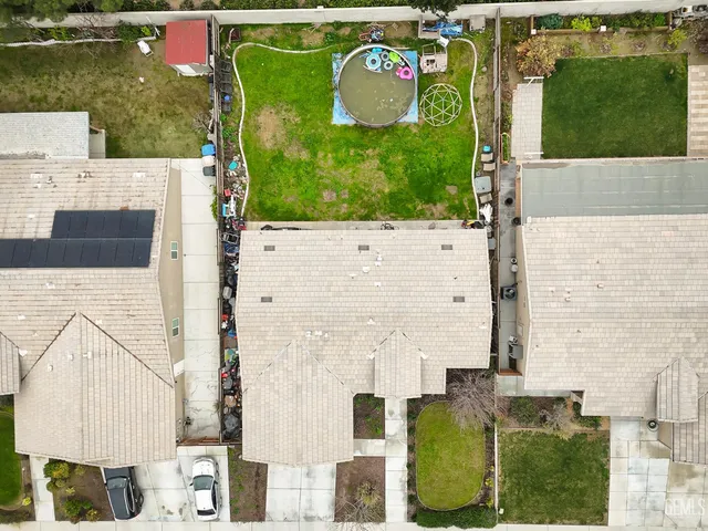 aerial view of a house with outdoor space