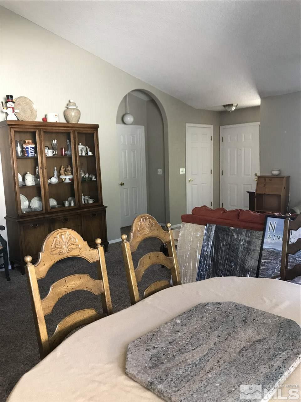 5305 Vista Ridge Way Reno, NV 89523 - Photo 5 of 11 a bedroom with two beds and painting on the wall