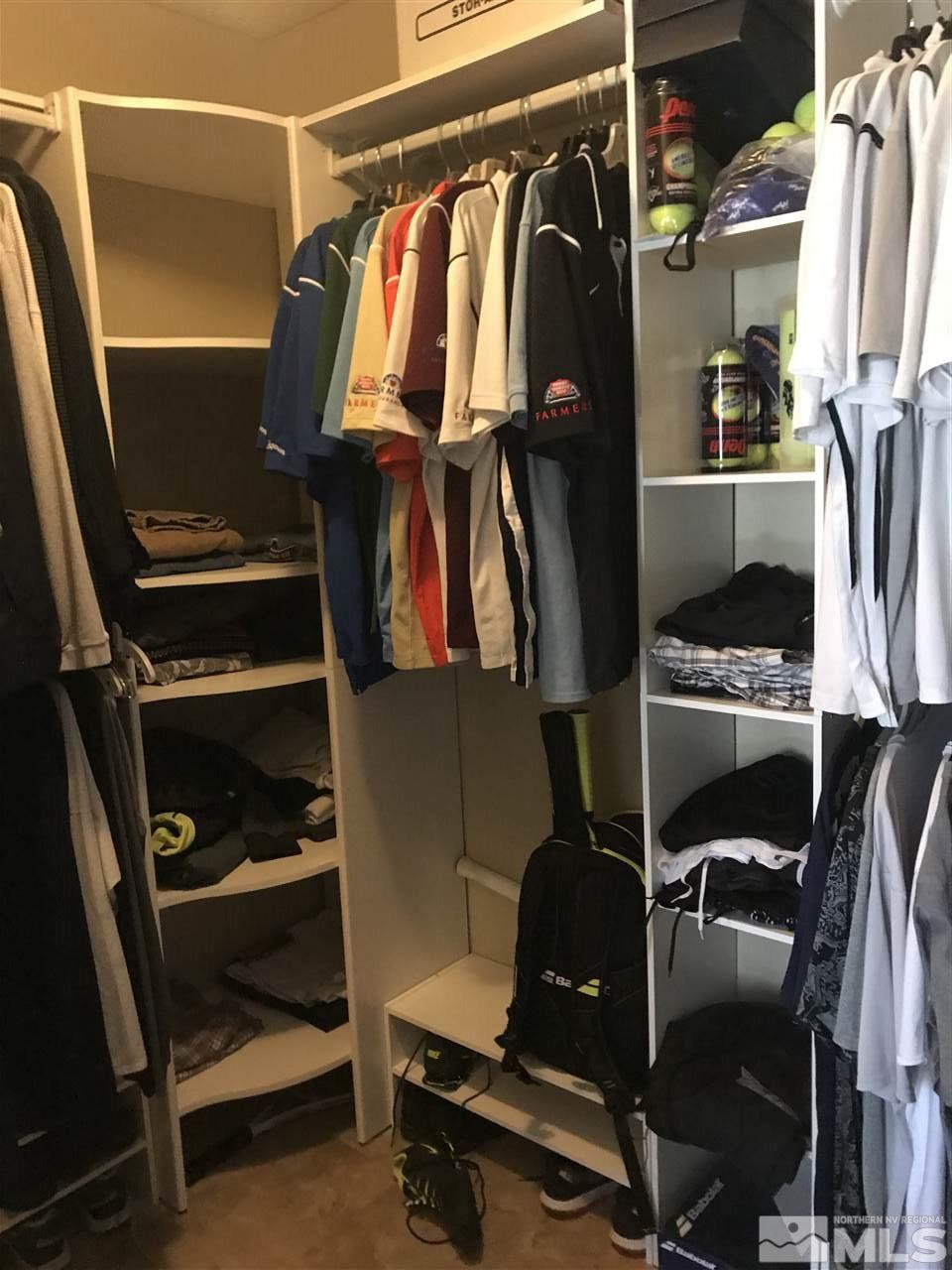 5305 Vista Ridge Way Reno, NV 89523 - Photo 8 of 11 a view of walk in closet with clothes and shoes