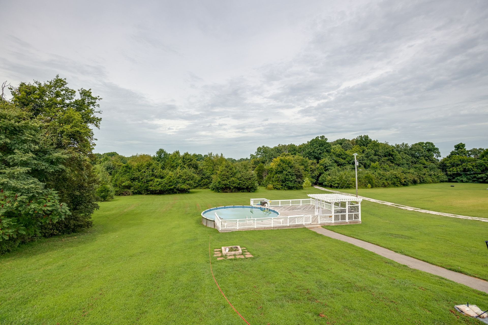 3321 Mahlon Moore Road Spring Hill, TN 37174 - Photo 2 of 22 a view of a house with a garden