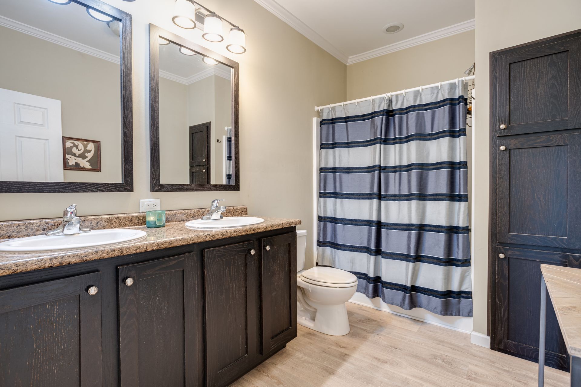 3321 Mahlon Moore Road Spring Hill, TN 37174 - Photo 16 of 22 a spacious bathroom with a double vanity sink a toilet and a shower