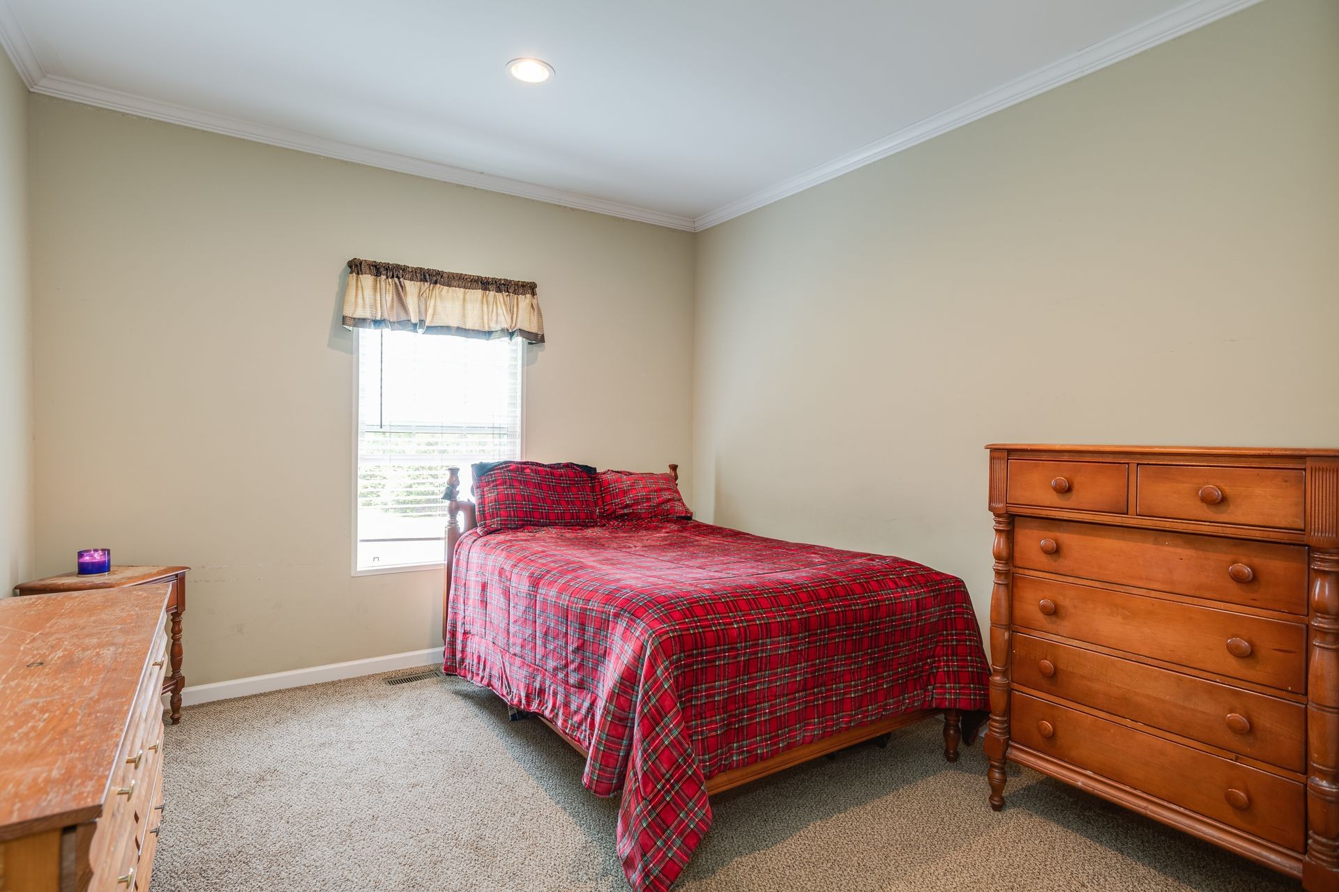 3321 Mahlon Moore Road Spring Hill, TN 37174 - Photo 17 of 22 a bedroom with a bed and a window
