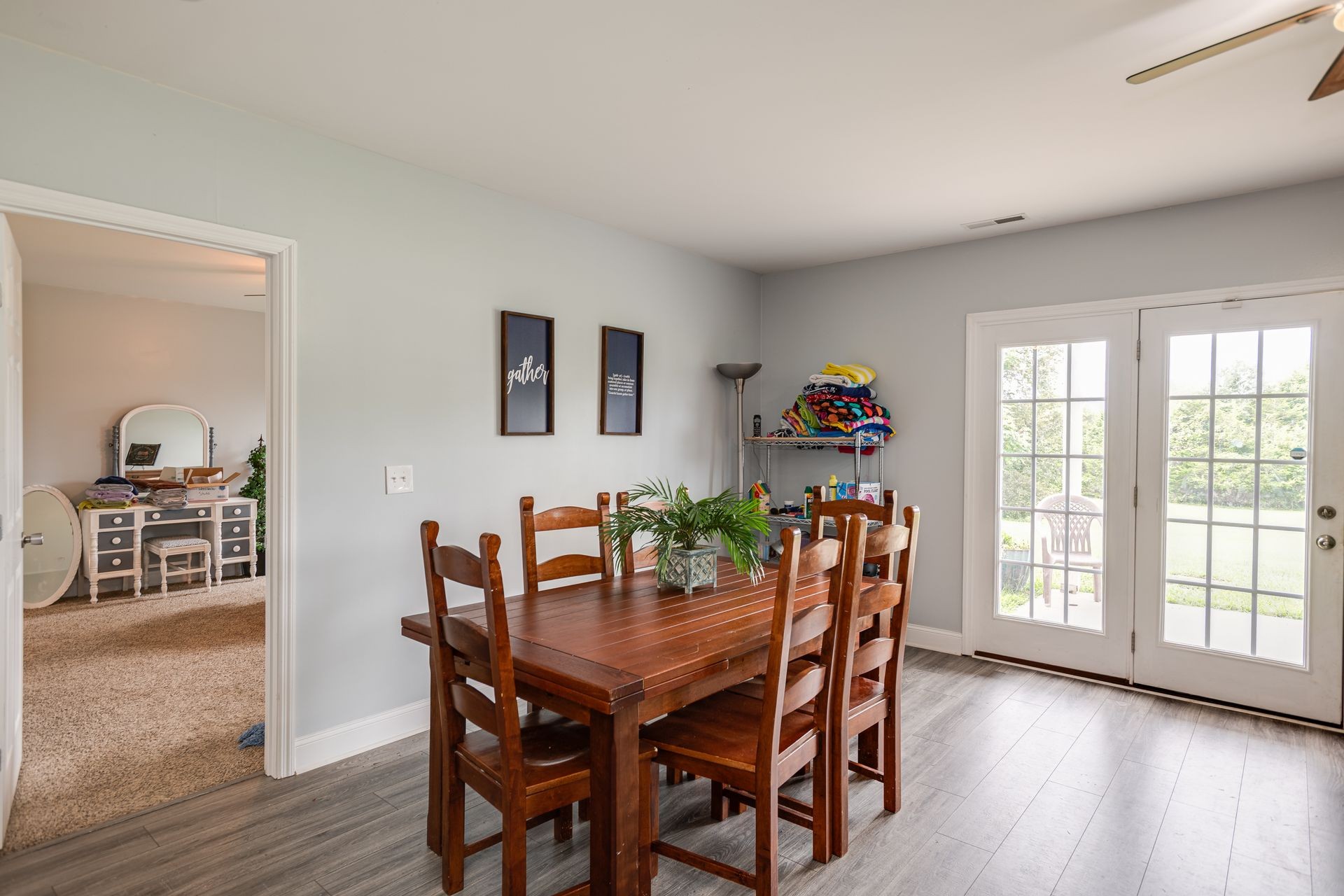 3321 Mahlon Moore Road Spring Hill, TN 37174 - Photo 20 of 22 a view of a dining room with furniture and wooden floor