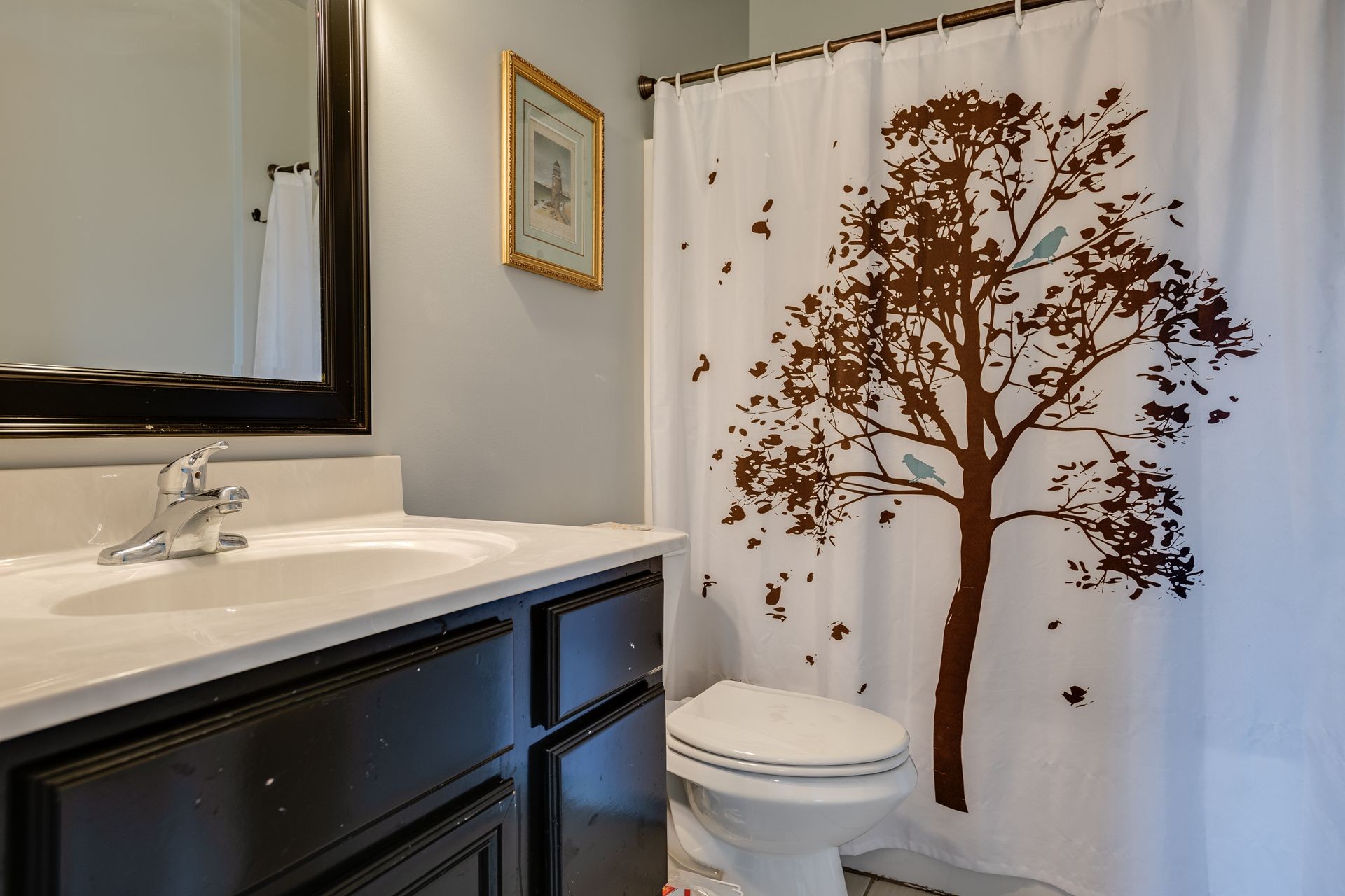3321 Mahlon Moore Road Spring Hill, TN 37174 - Photo 22 of 22 a bathroom with a sink toilet and shower