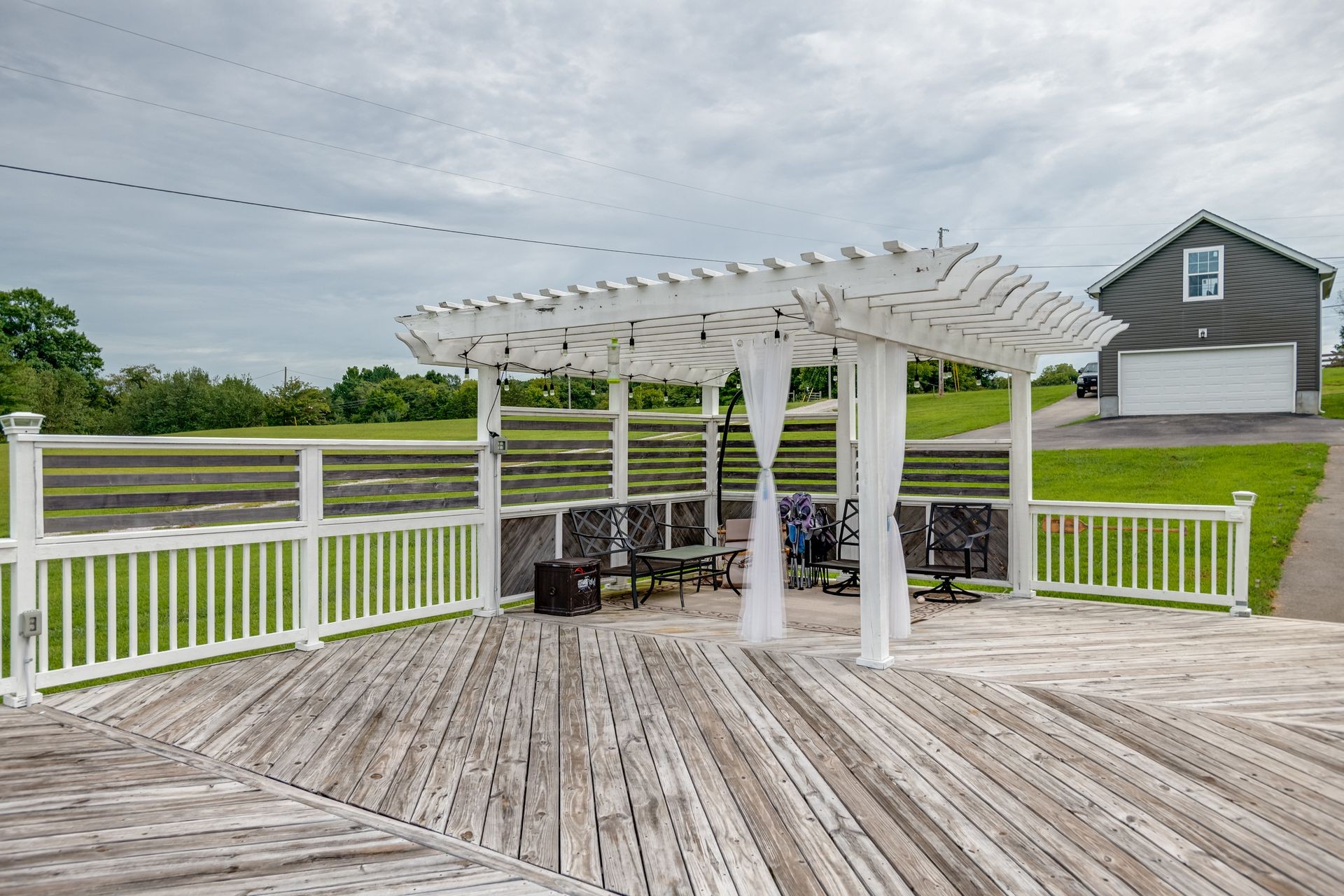 3321 Mahlon Moore Road Spring Hill, TN 37174 - Photo 4 of 22 a view of a house with a roof deck
