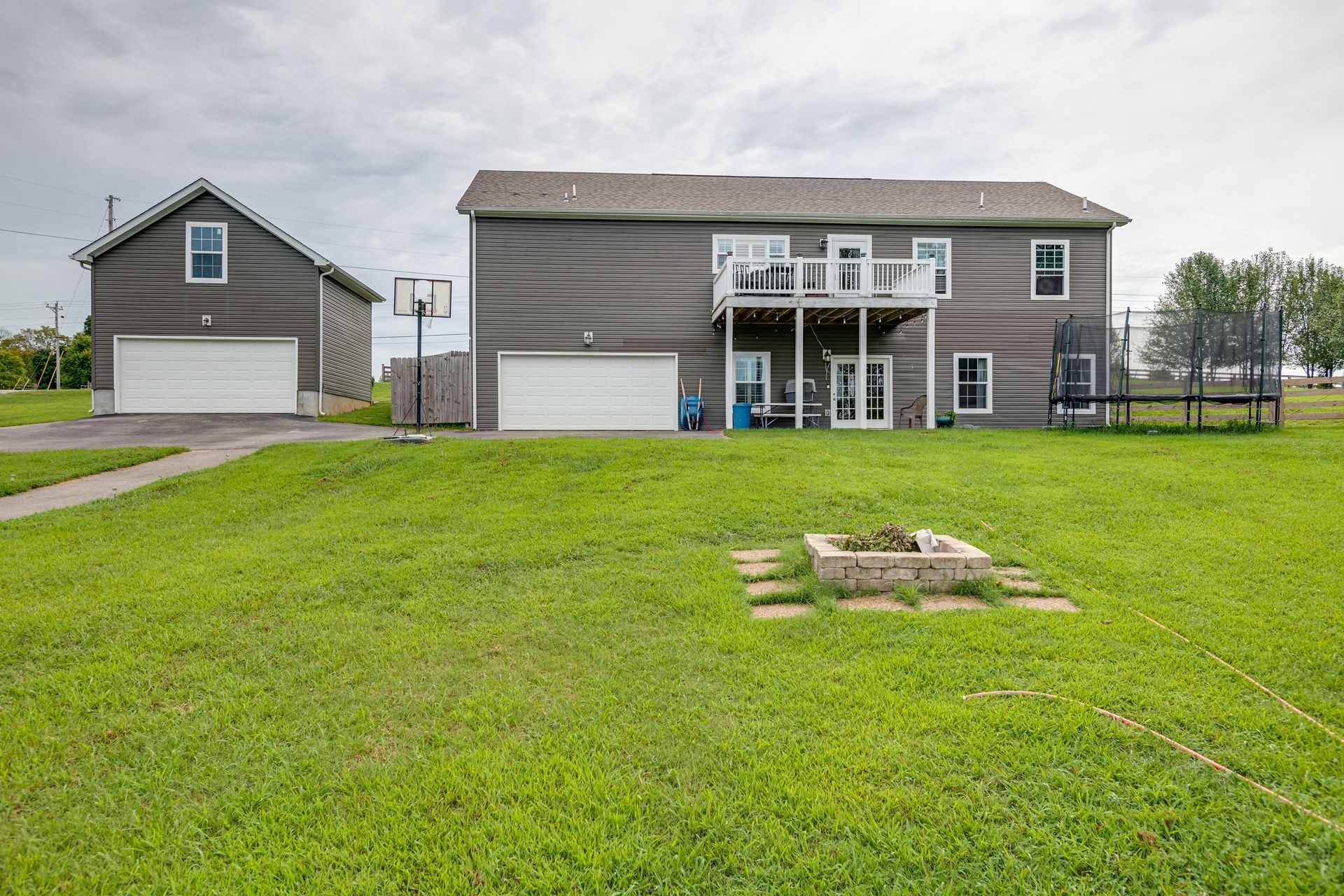 3321 Mahlon Moore Road Spring Hill, TN 37174 - Photo 5 of 22 a front view of a house with a yard and trees