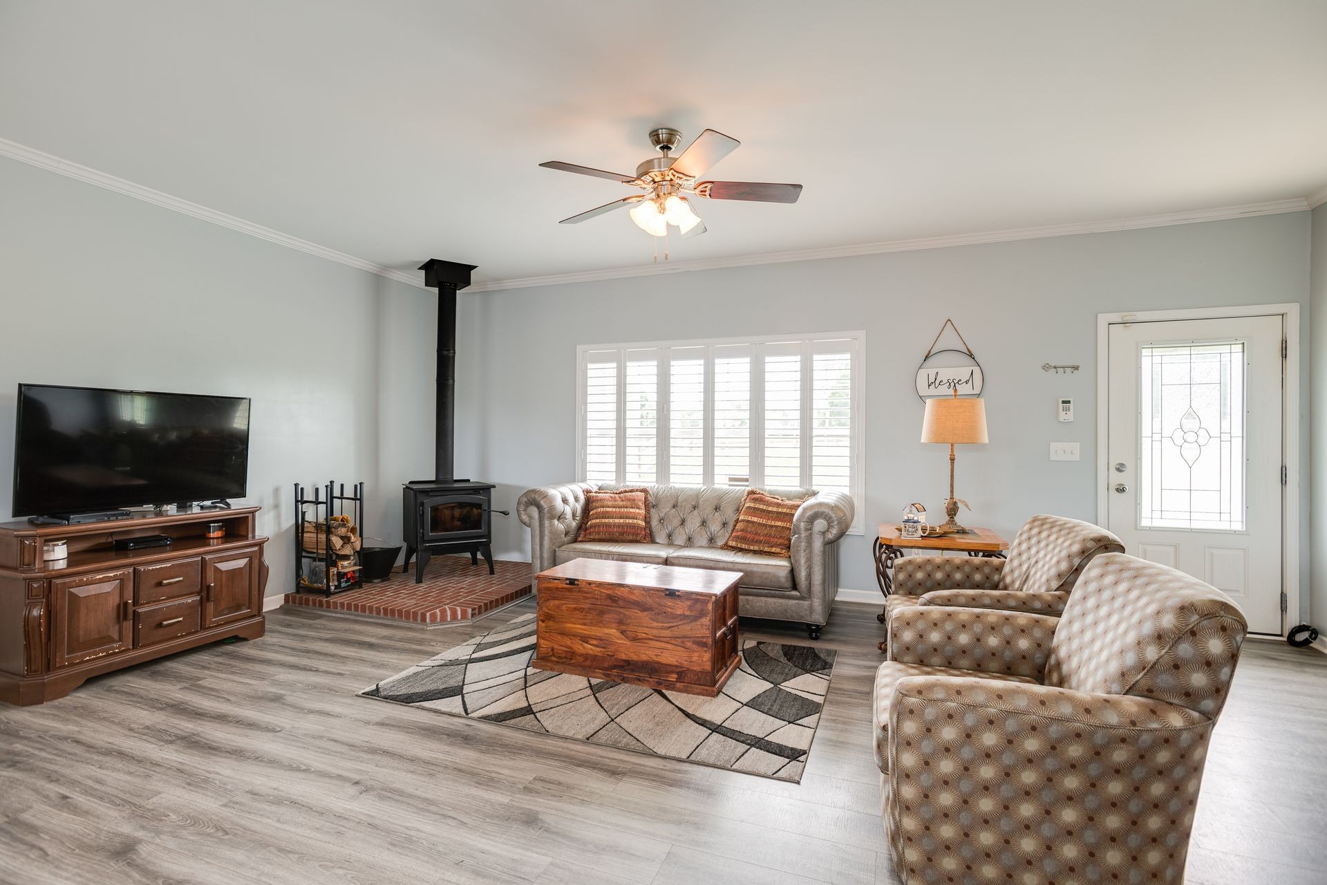3321 Mahlon Moore Road Spring Hill, TN 37174 - Photo 6 of 22 a living room with furniture and a flat screen tv
