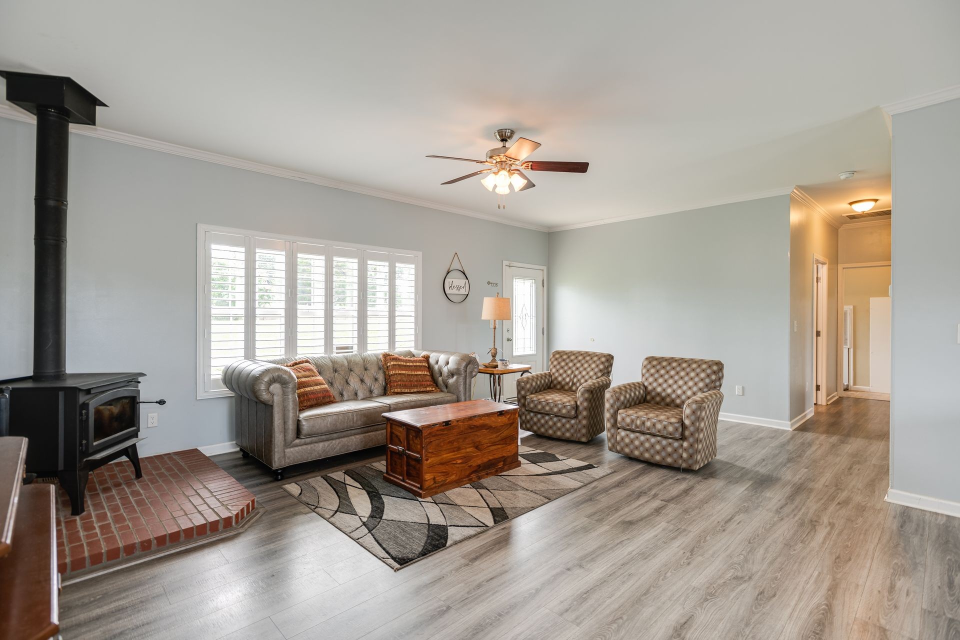 3321 Mahlon Moore Road Spring Hill, TN 37174 - Photo 7 of 22 a living room with furniture and a wooden floor