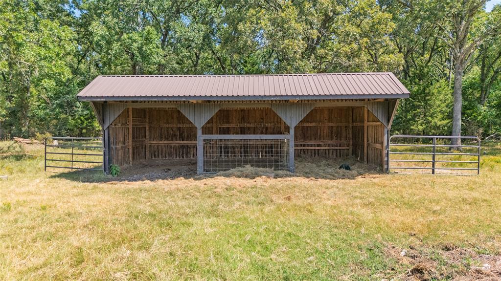 1516 Rancho Road Quinlan, TX 75474 - Photo 37 of 40 a view of a house with a outdoor space