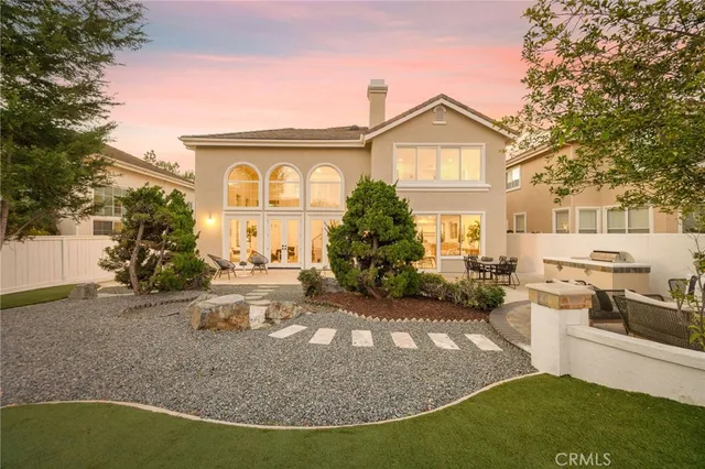 a view of a house with entertaining space