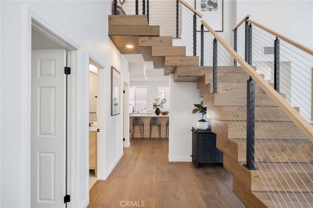 6 Broadleaf Irvine, CA 92612 - Photo 17 of 46 a view of entryway and hall with wooden floor