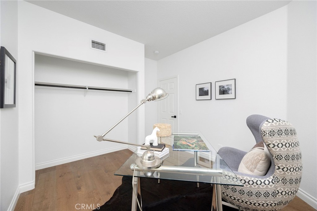 6 Broadleaf Irvine, CA 92612 - Photo 23 of 46 a dining room with furniture and wooden floor