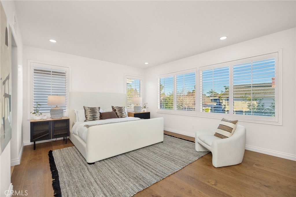 6 Broadleaf Irvine, CA 92612 - Photo 24 of 46 a room with a bed and a couch