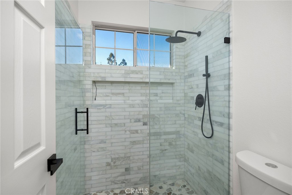 6 Broadleaf Irvine, CA 92612 - Photo 33 of 46 a bathroom with a shower