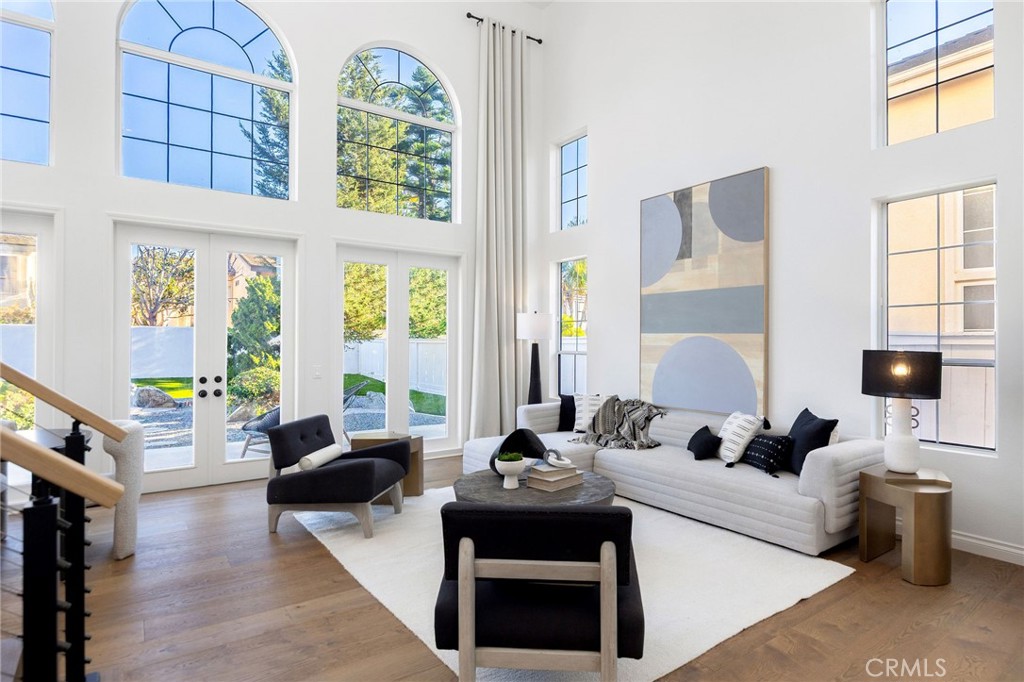 6 Broadleaf Irvine, CA 92612 - Photo 4 of 46 a living room with furniture fireplace and a large window