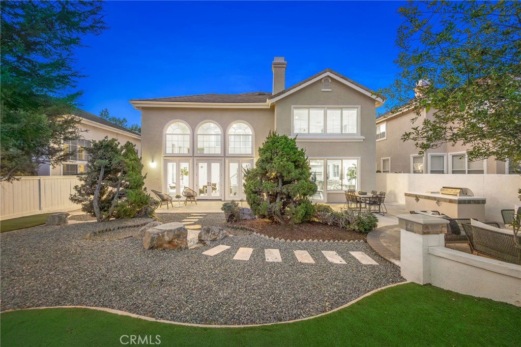 6 Broadleaf Irvine, CA 92612 - Photo 42 of 46 a front view of a house with a yard