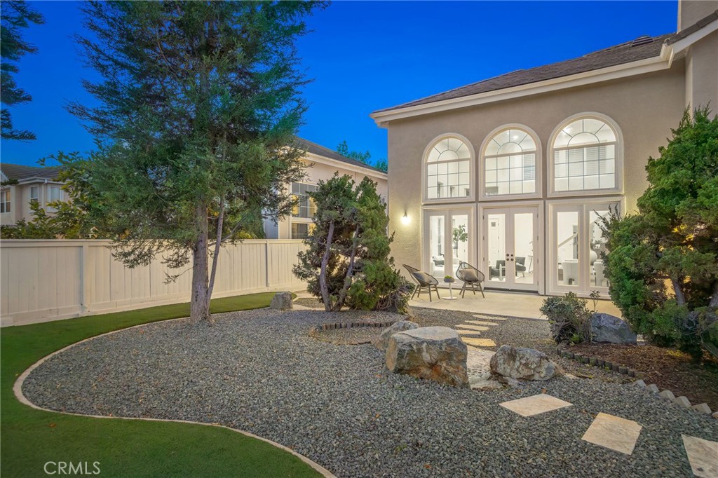 6 Broadleaf Irvine, CA 92612 - Photo 43 of 46 a front view of a house with a garden