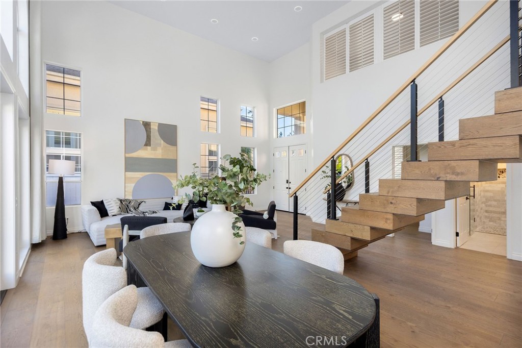 6 Broadleaf Irvine, CA 92612 - Photo 7 of 46 a view of a dining room with furniture and wooden floor