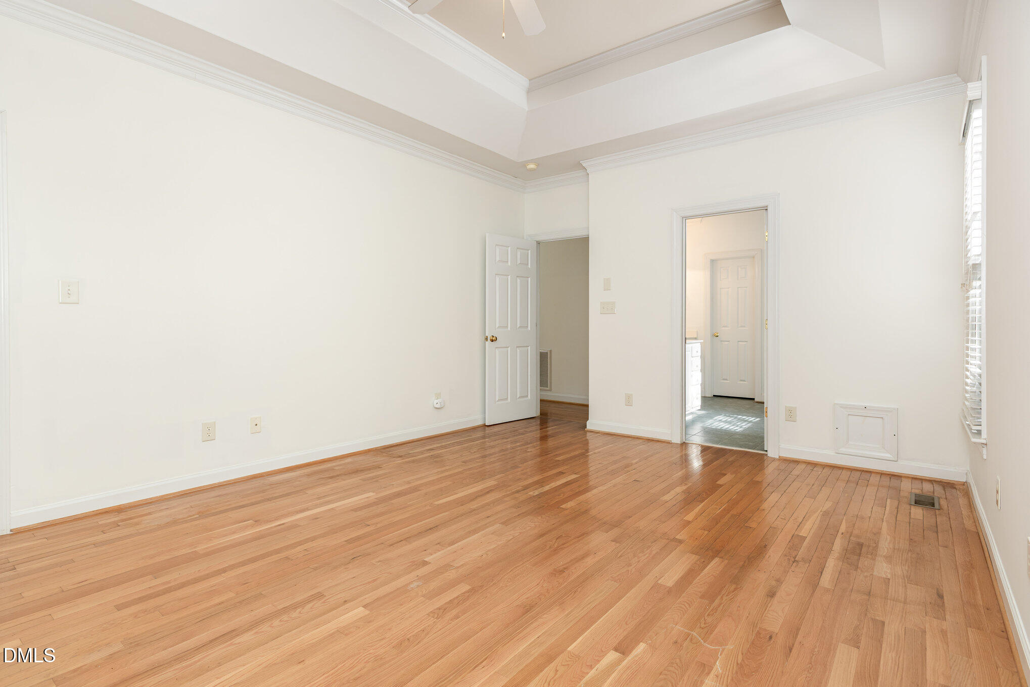 209 Manor Ridge Road Carrboro, NC 27510 - Photo 16 of 39 a view of an empty room with wooden floor