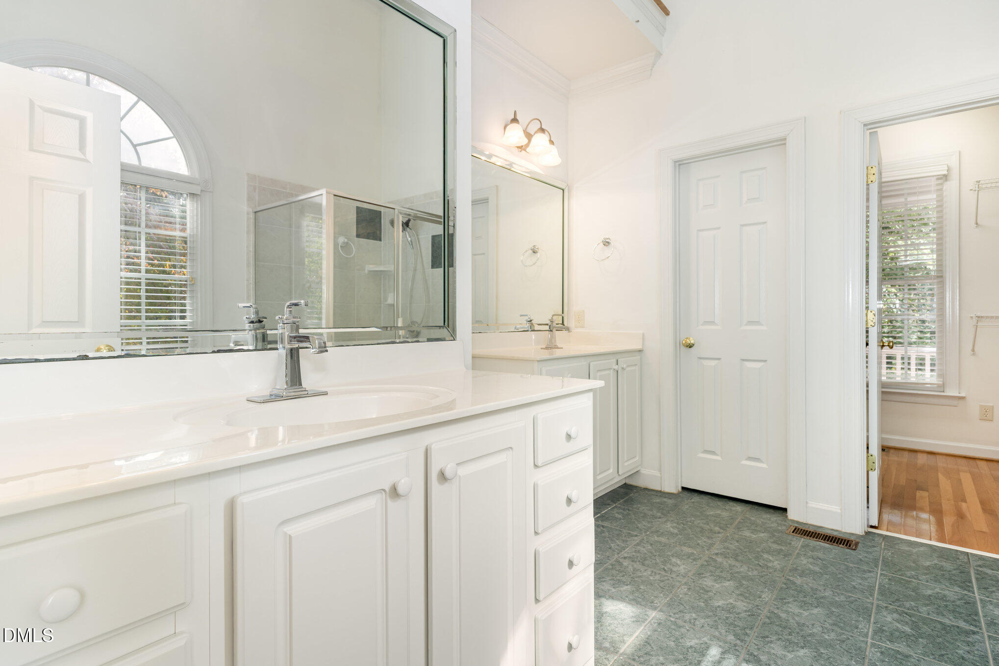 209 Manor Ridge Road Carrboro, NC 27510 - Photo 17 of 39 a bathroom with a sink and a mirror