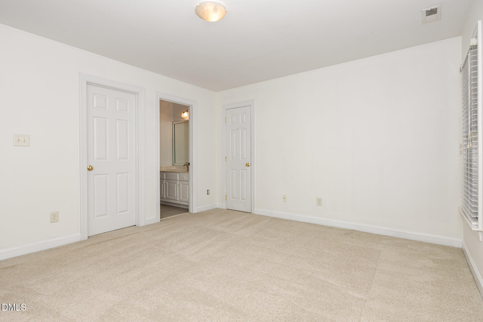 209 Manor Ridge Road Carrboro, NC 27510 - Photo 21 of 39 an empty room with closet area
