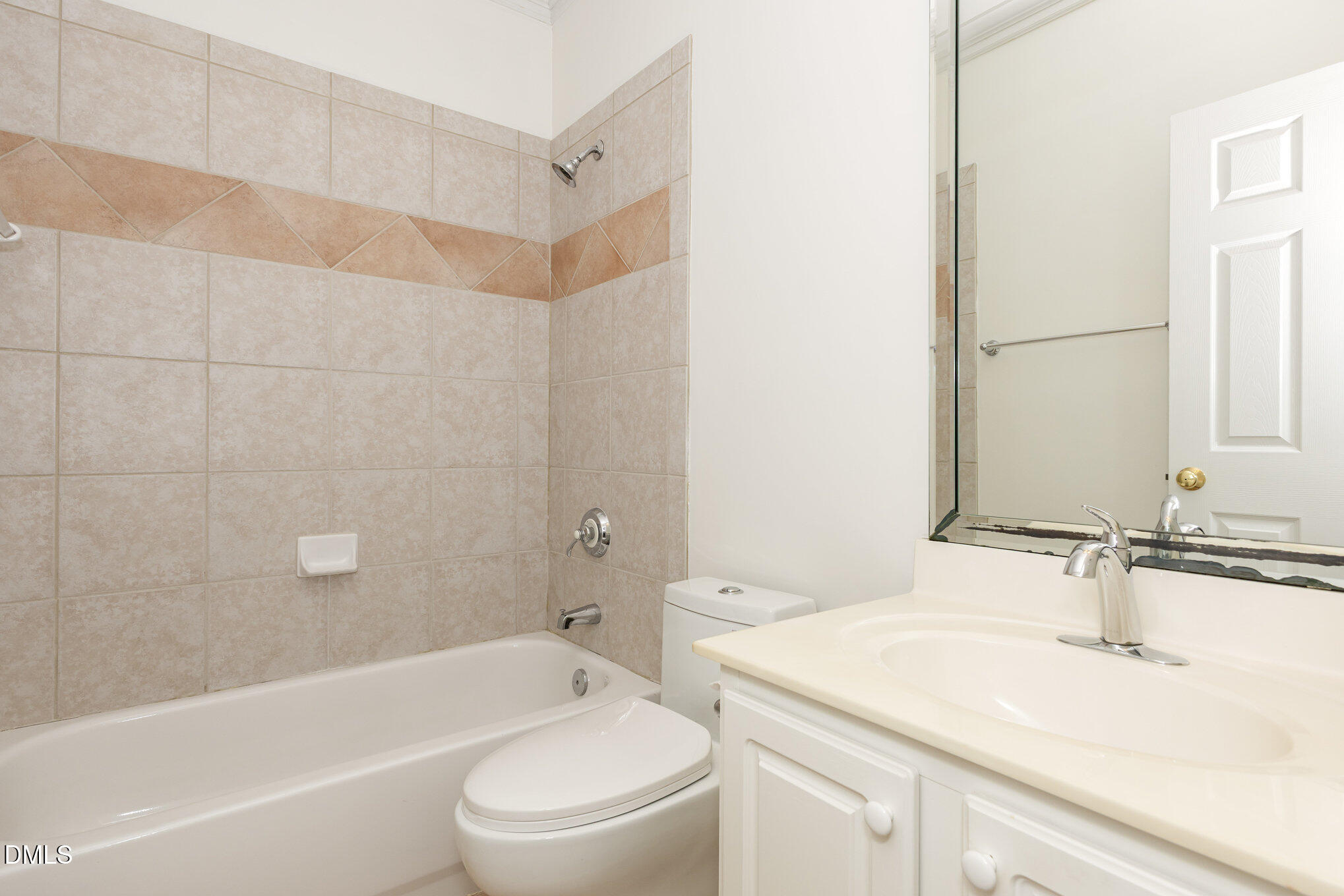 209 Manor Ridge Road Carrboro, NC 27510 - Photo 22 of 39 a bathroom with a granite countertop sink a toilet and bathtub