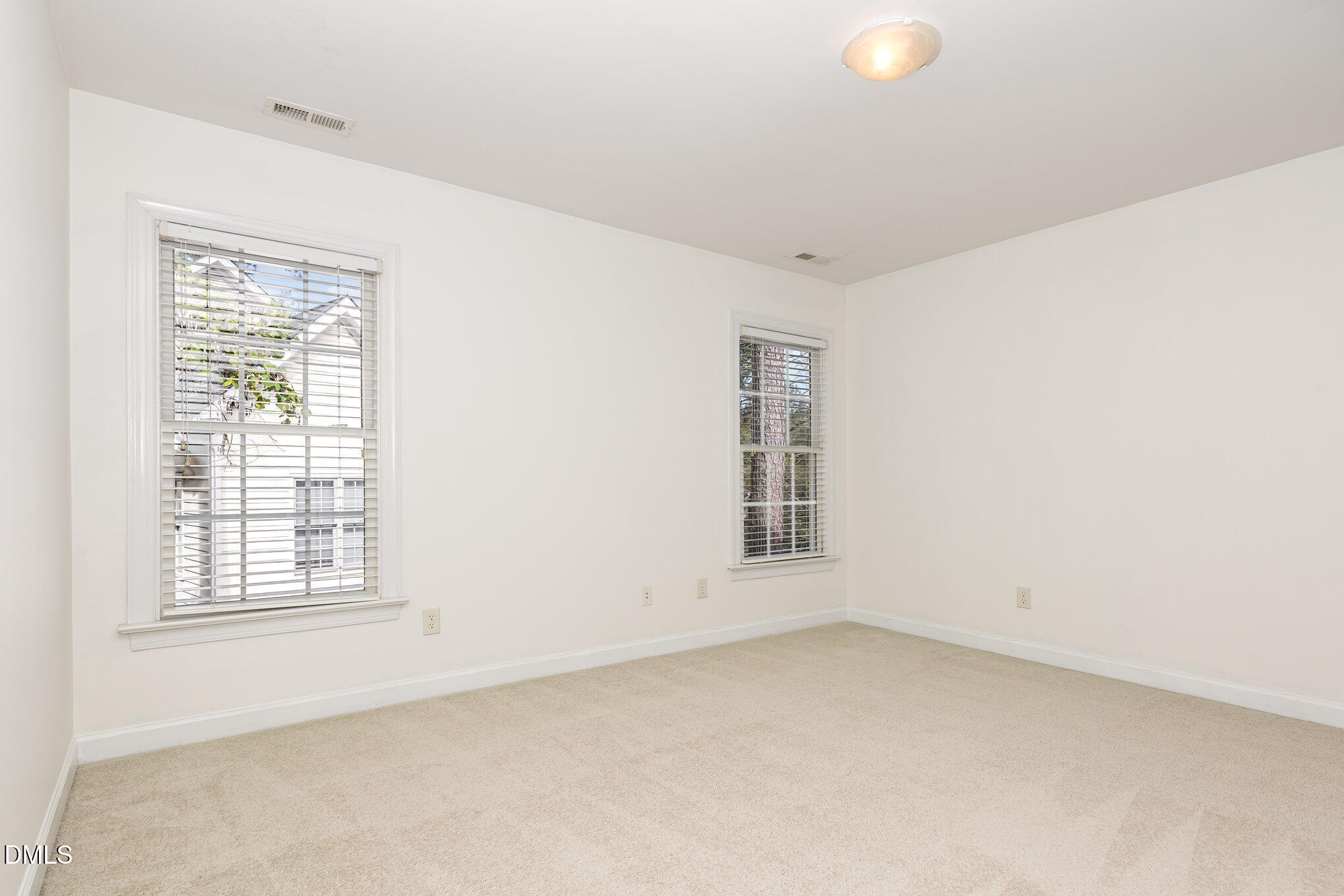 209 Manor Ridge Road Carrboro, NC 27510 - Photo 25 of 39 an empty room with windows