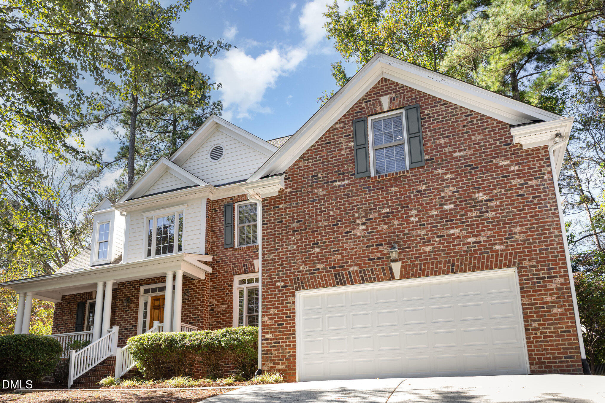 209 Manor Ridge Road Carrboro, NC 27510 - Photo 2 of 39 a front view of a house with a tree