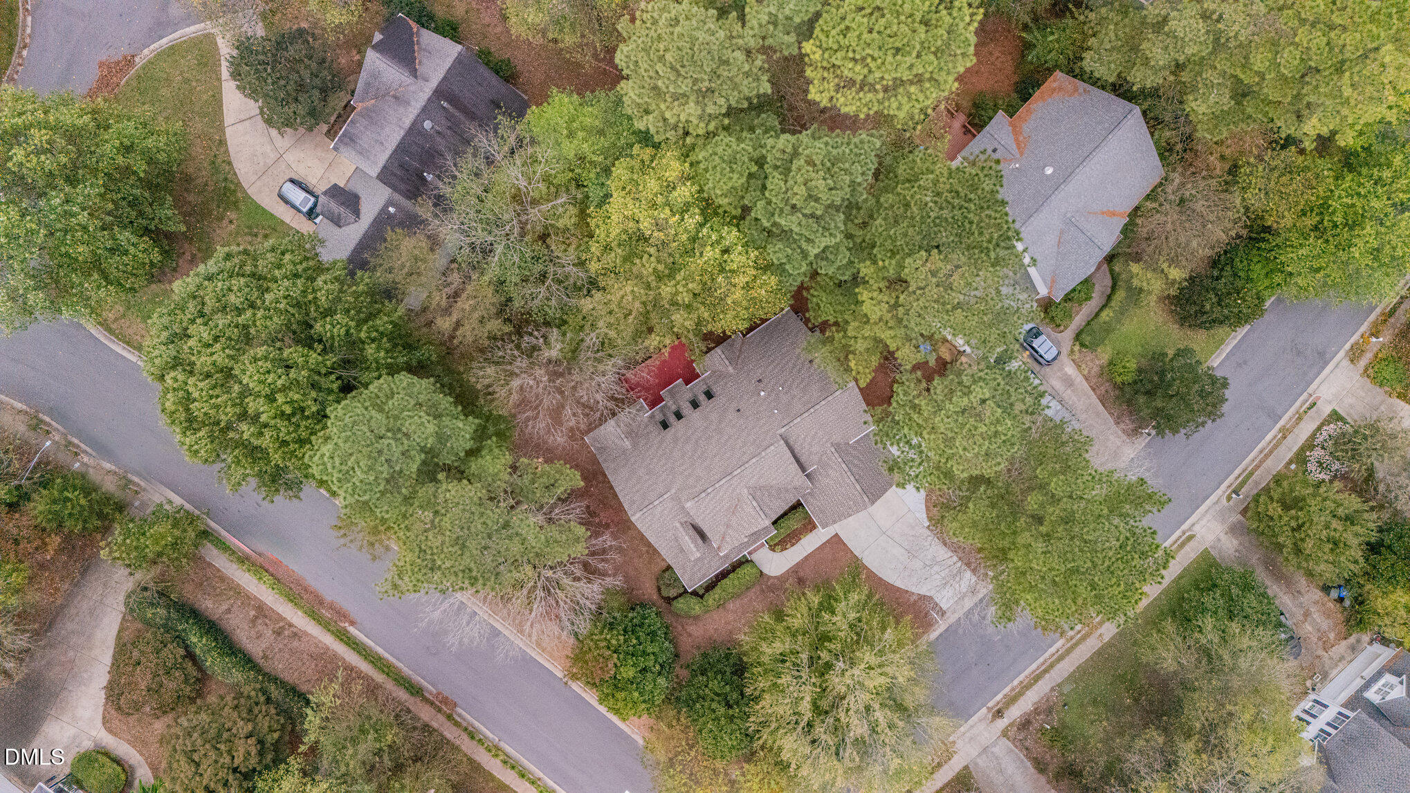 209 Manor Ridge Road Carrboro, NC 27510 - Photo 33 of 39 an aerial view of a house with a yard and a large tree