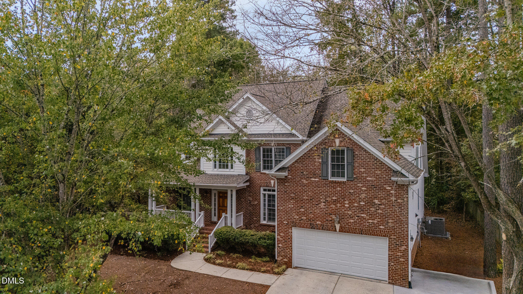 209 Manor Ridge Road Carrboro, NC 27510 - Photo 34 of 39 a front view of a house with a garden