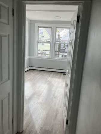 a view of an empty room and window