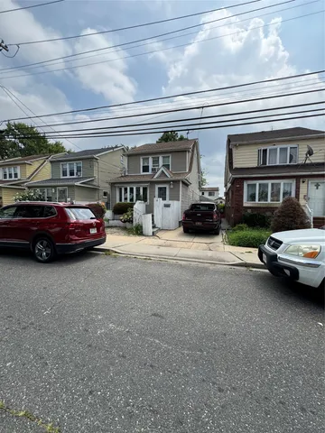 a cars parked in front of a building
