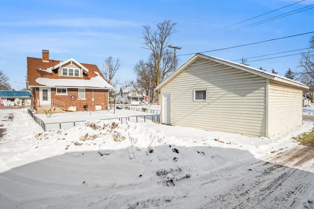 a view of a house with a snow