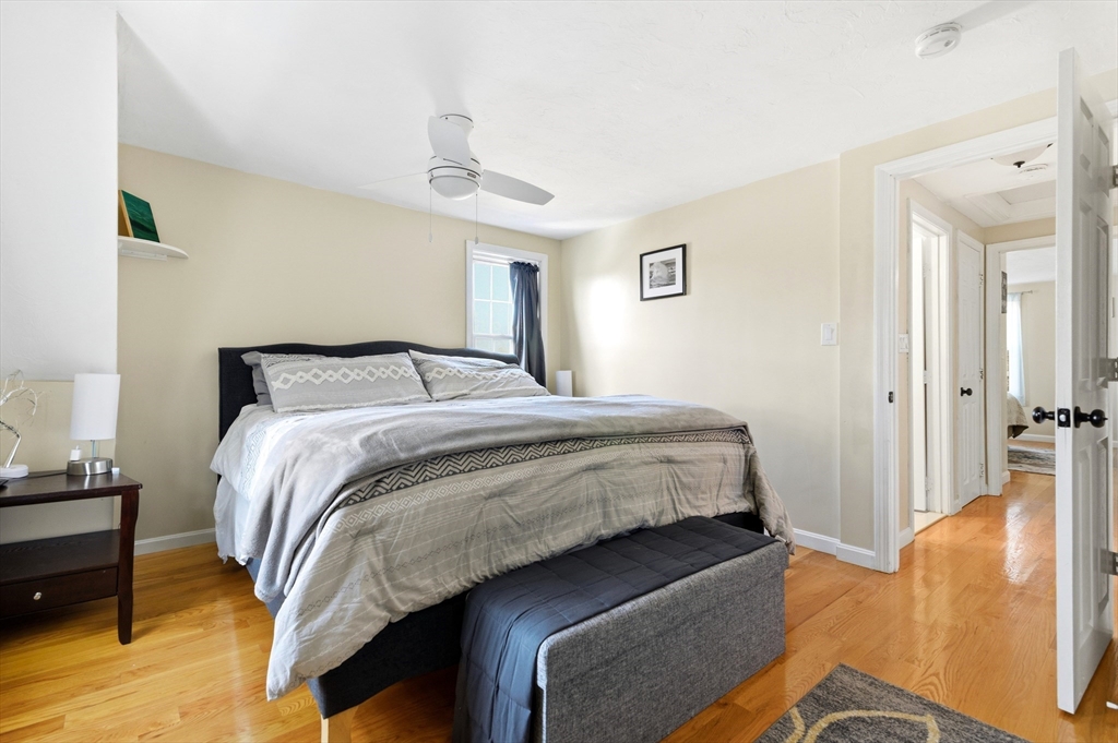 30 Huntington Road Plymouth, MA 02360 - Photo 16 of 35 a bedroom with a bed and wooden floor