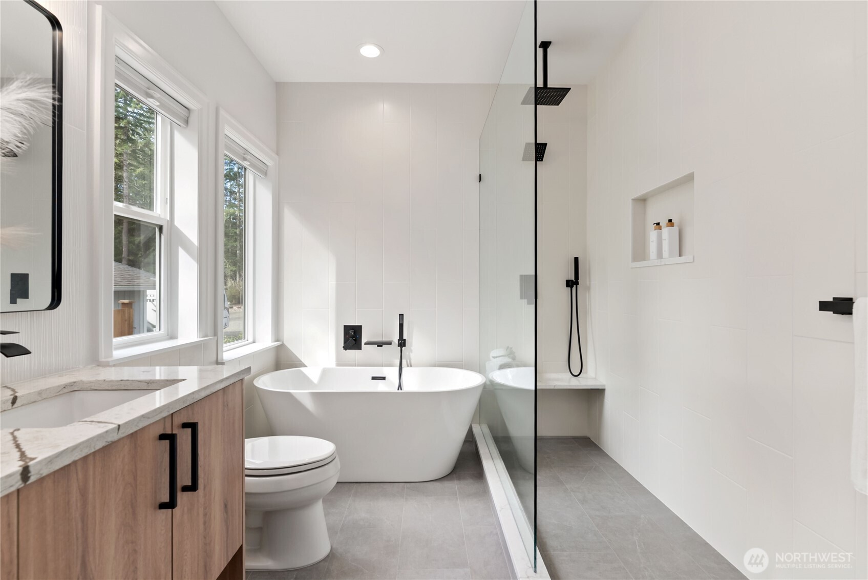 31 East Rhododendron Court Union, WA 98592 - Photo 22 of 38 a bathroom with a double vanity sink toilet and shower