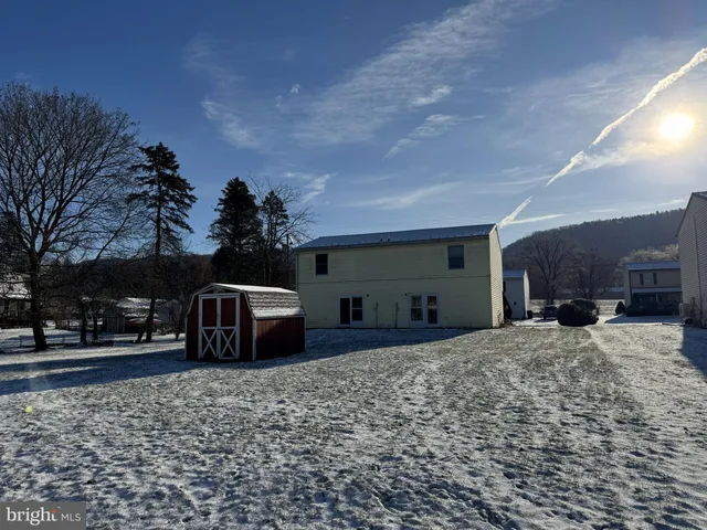 a house view with a outdoor space