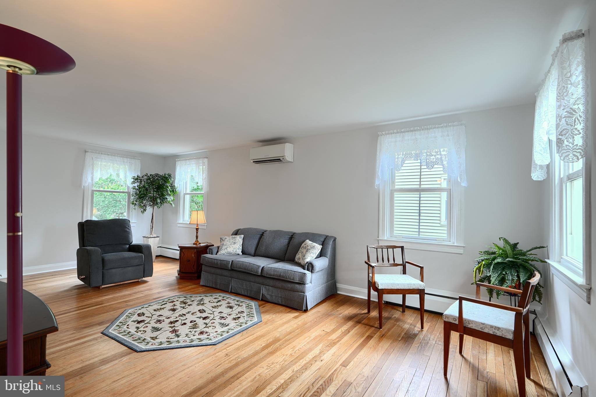503 North Stuart Street Baltimore, MD 21221 - Photo 12 of 47 Living Room measures 23'x12'