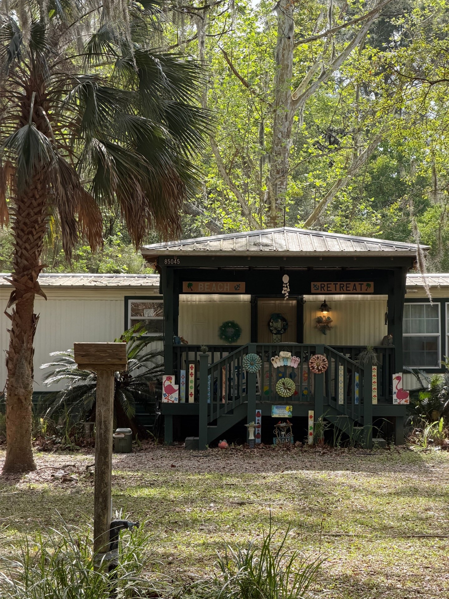 85045 Lonnie Crews Road Fernandina Beach, FL 32034 - Photo 11 of 28 a view of a house with a yard