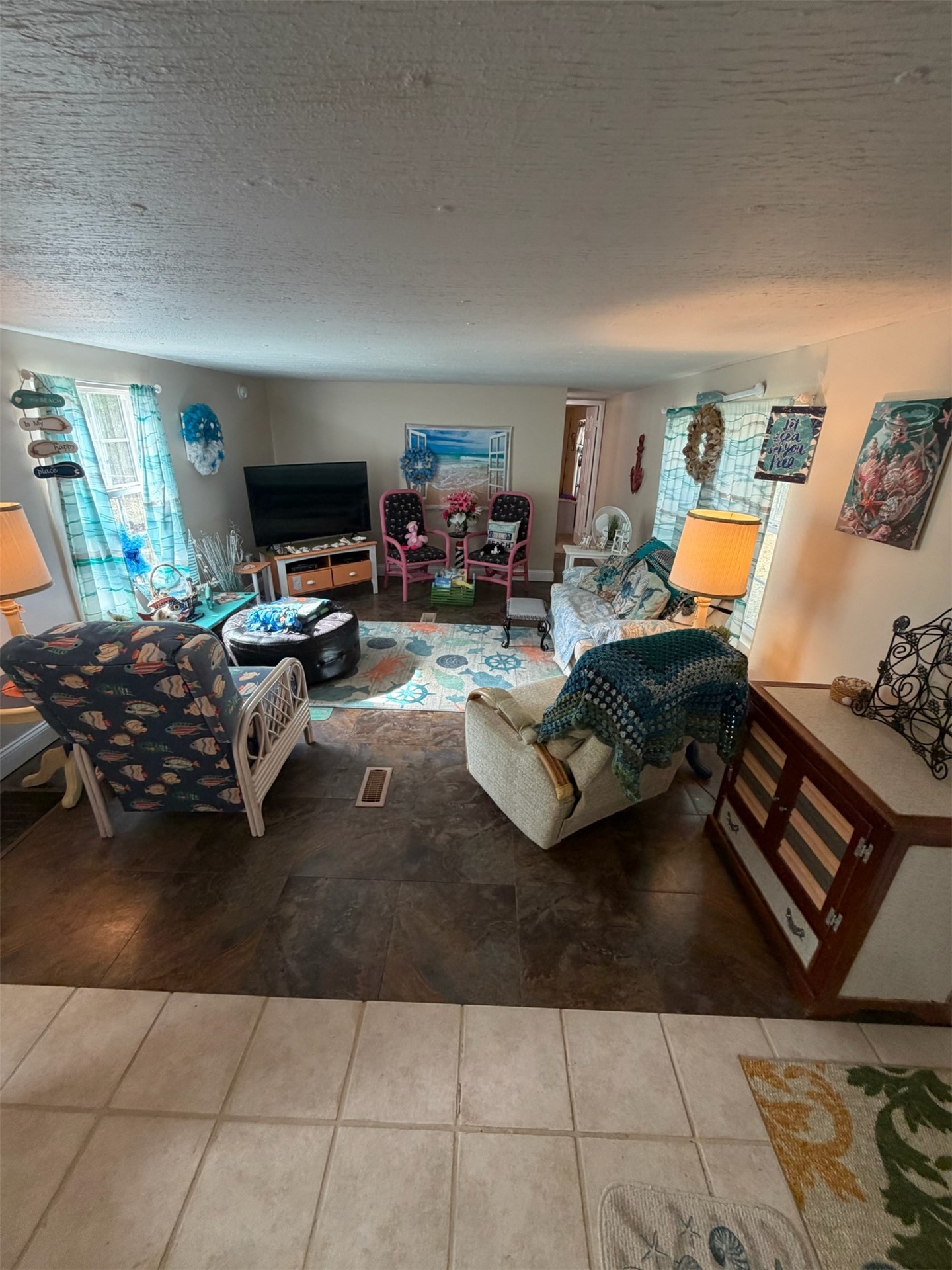 85045 Lonnie Crews Road Fernandina Beach, FL 32034 - Photo 13 of 28 a living room with furniture and a flat screen tv