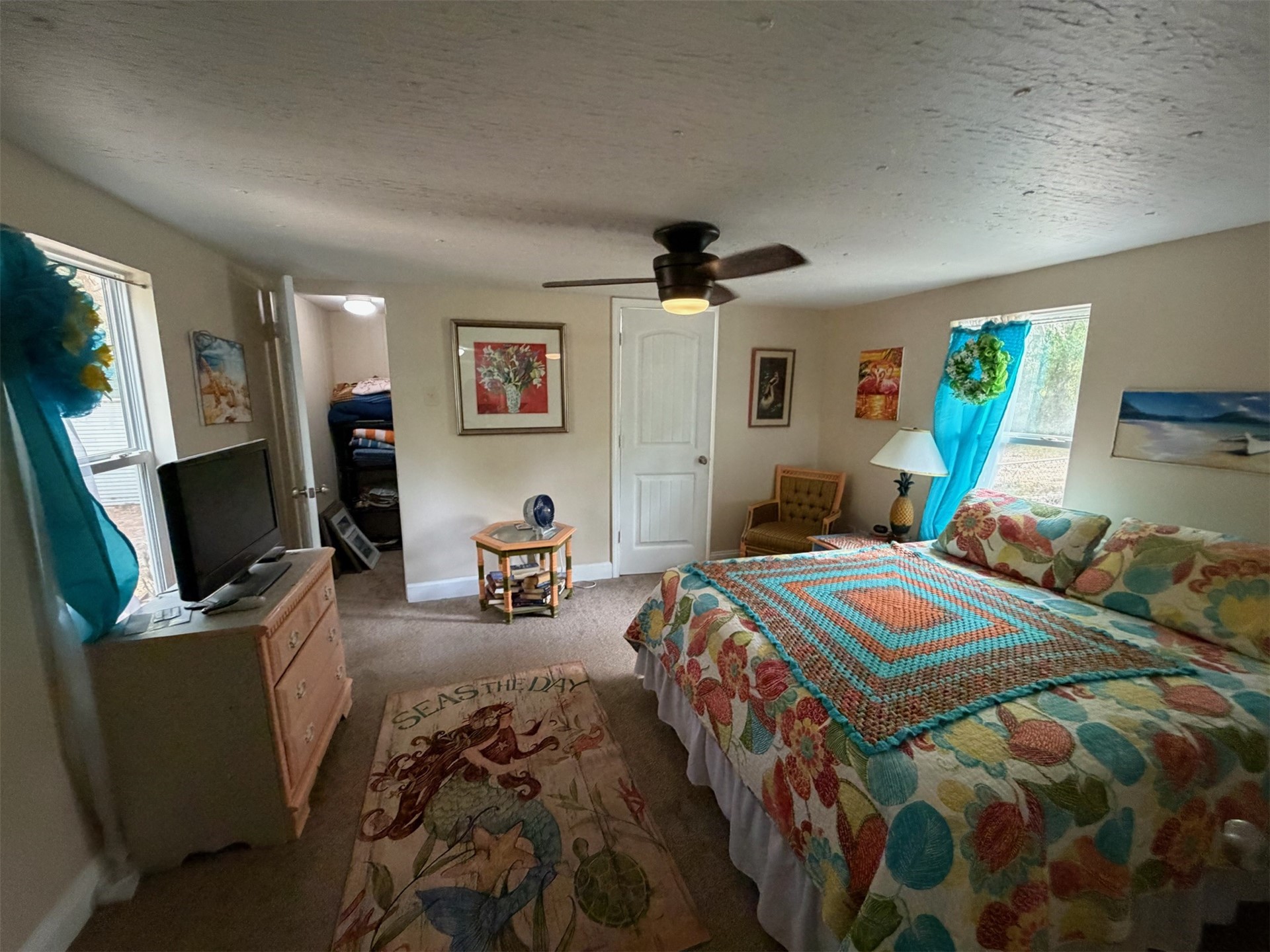 85045 Lonnie Crews Road Fernandina Beach, FL 32034 - Photo 17 of 28 a bedroom with bed and a flat screen tv