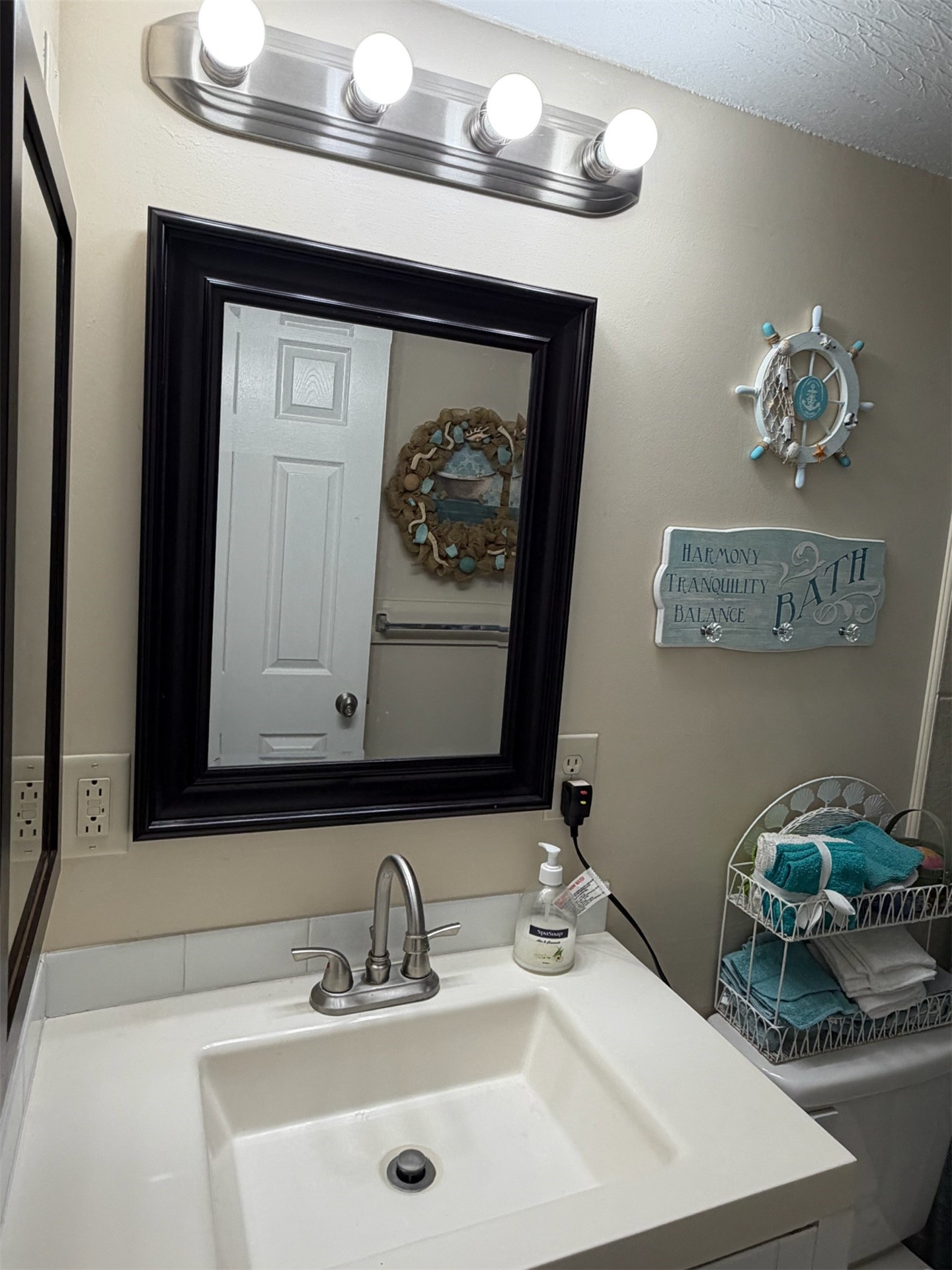 85045 Lonnie Crews Road Fernandina Beach, FL 32034 - Photo 20 of 28 a bathroom with a sink and a mirror
